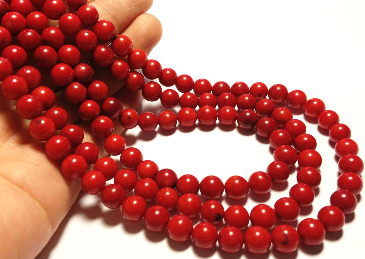 8mm rounds, bamboo coral, true red, 16 inch strand.
