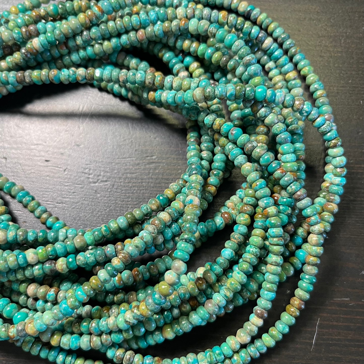 4mm Greenish Blue Chinese Turquoise Rondelles. 15.75 inch strand.
