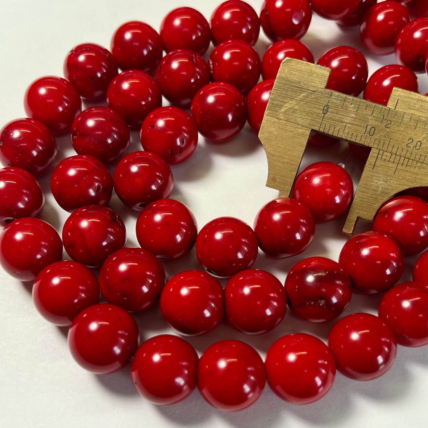 13.5mm rounds, bamboo coral, 16 inch strand.