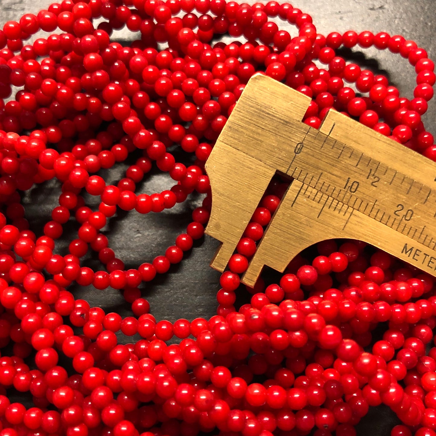 3.2mm rounds, bamboo coral, true red, 16 inch strand.