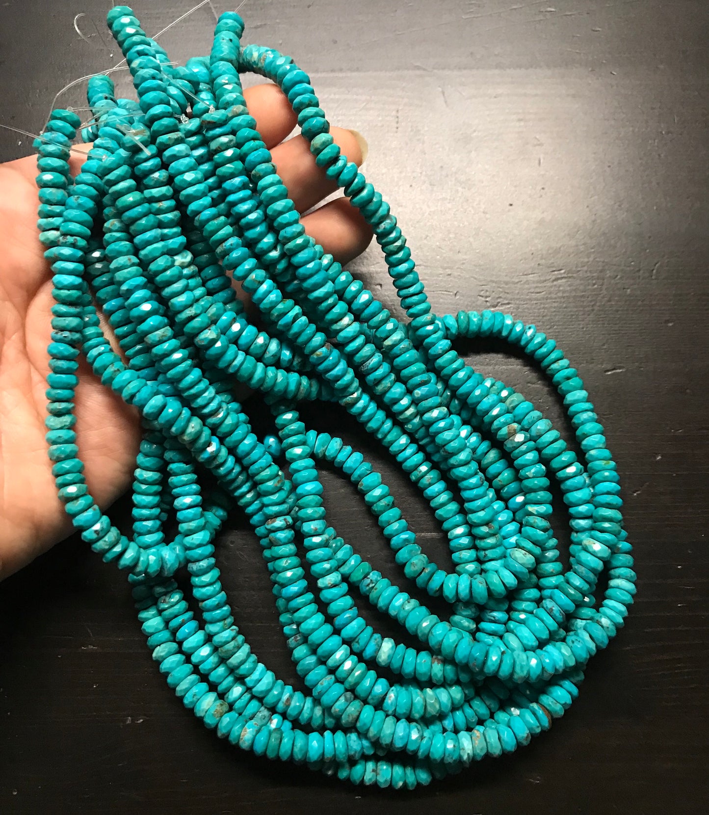 6.5mm Nacozari Turquoise Faceted Rondelles. 15.75 inch strand.