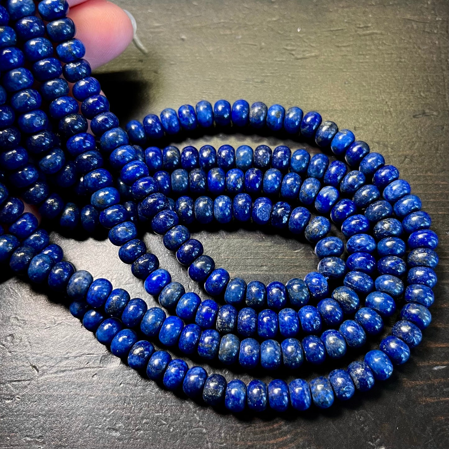 6mm Dark blue lapis lazuli rondelles. 15.5 inches long.