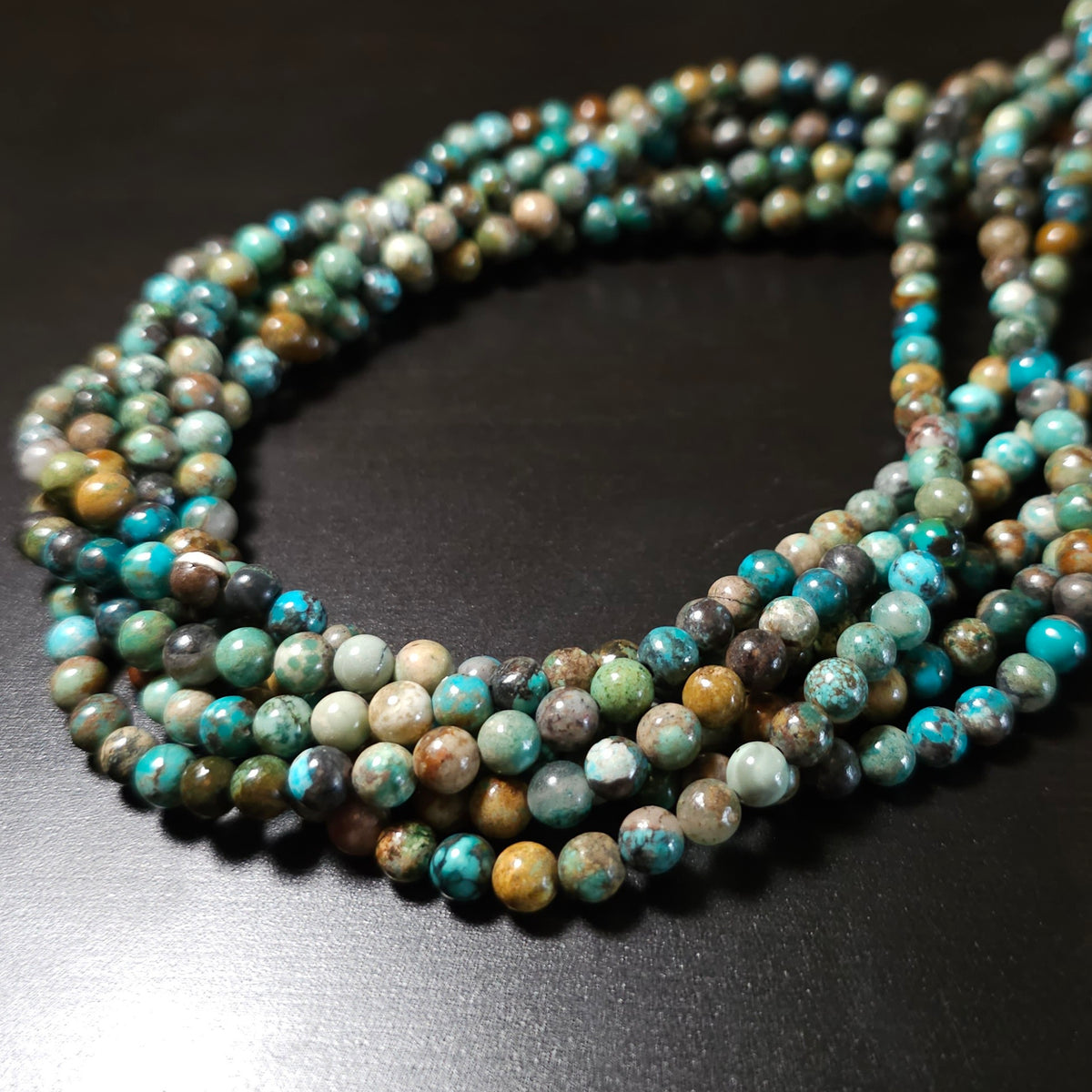 5mm Hubei Turquoise Rounds. Natural mixed quality of turquoise, 16 inch strand.