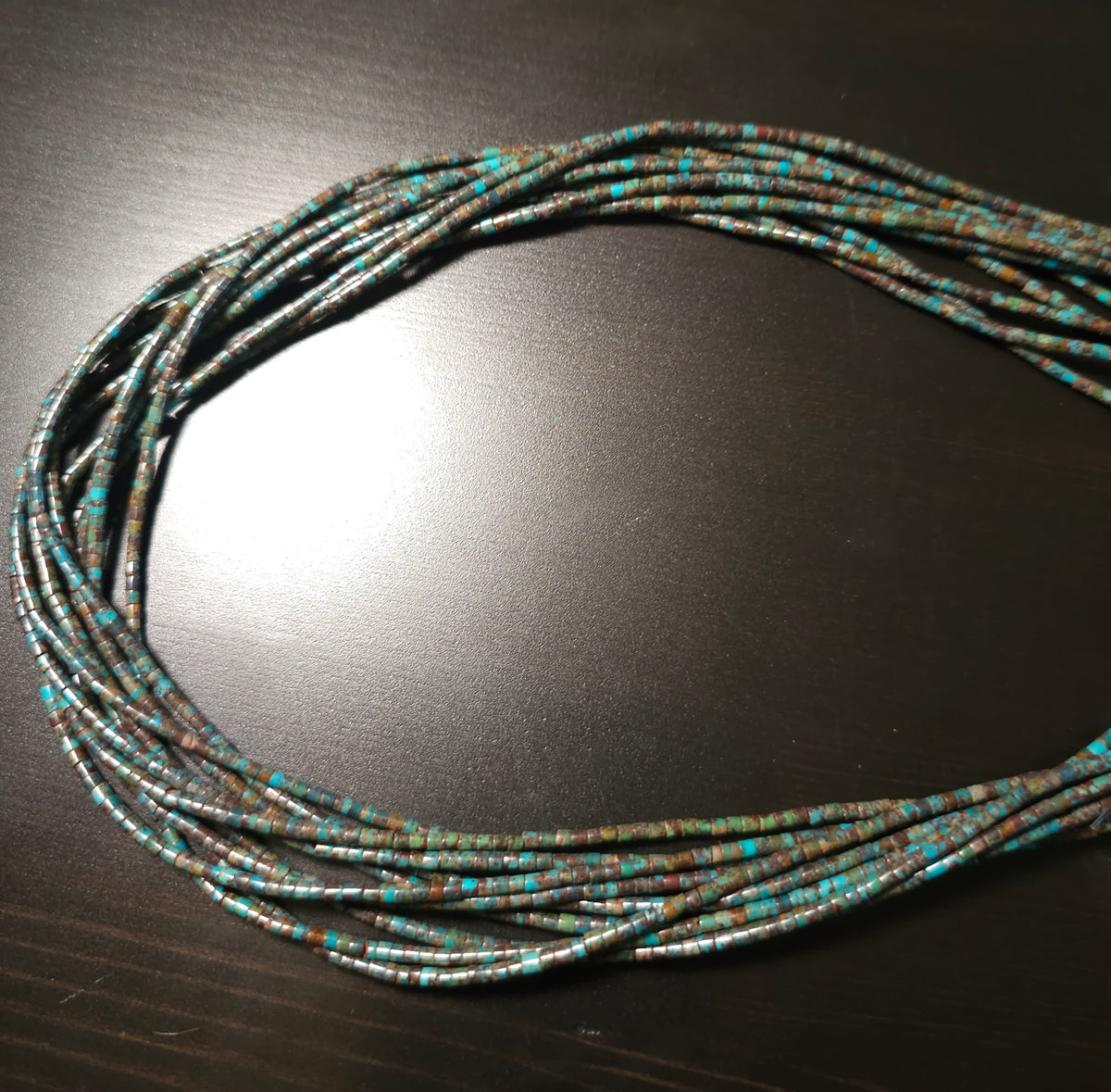 2mm Turquoise Heishi. 16 inch strand.