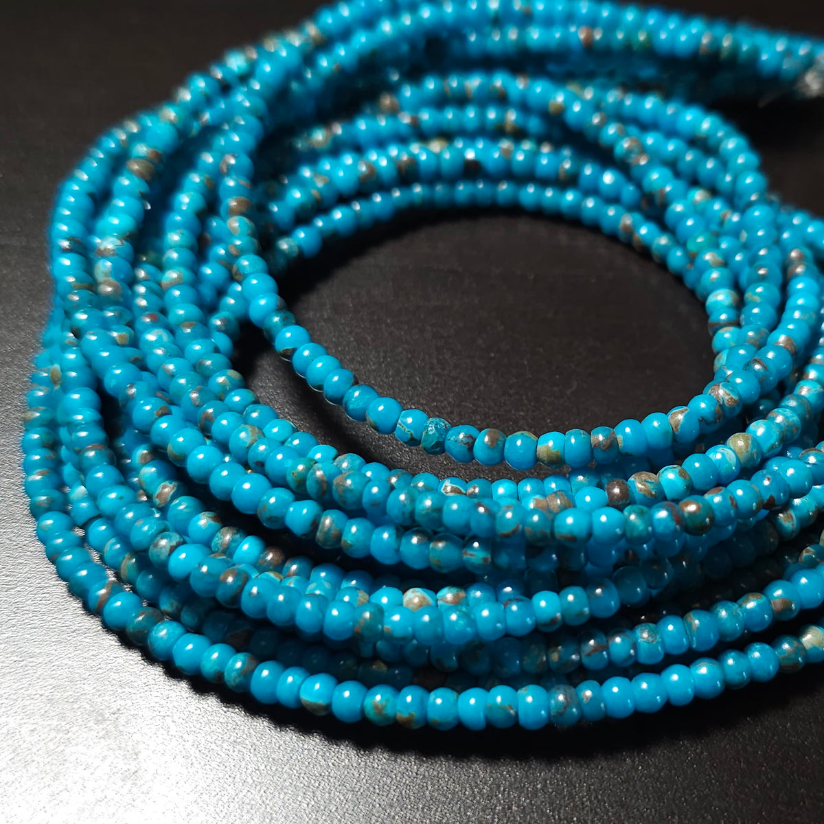 3mm Dyed Turquoise Rondelles, 16 inches long.
