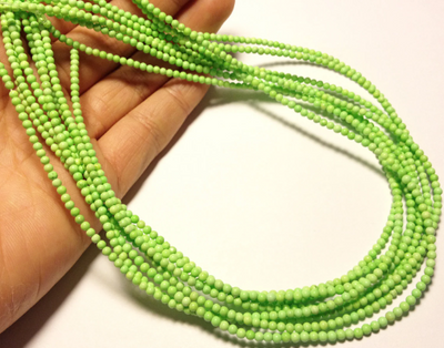 2mm Magnesite Rounds, light green, 16 inch strand.