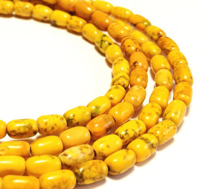 3mm Magnesite tubes, golden yellow, 16 inch strand.