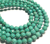 6mm Magnesite Faceted Rounds, Teal Blue, 16 inch strand.