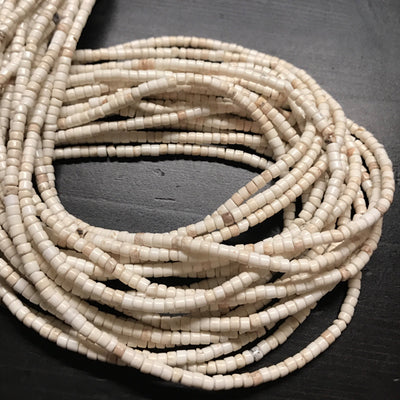 3mm Magnesite Heishi. StonyWhite, 16 inch strand.