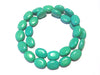 Magnesite ovals, teal blue, 10x14mm per piece, 16 inch strand.