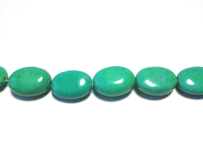 Magnesite ovals, teal blue, 10x14mm per piece, 16 inch strand.