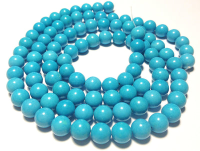 8.5mm Magnesite rounds, blue, 16 inch strand.