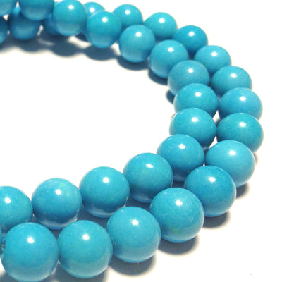 8.5mm Magnesite rounds, blue, 16 inch strand.