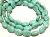 12x16mm Magnesite ovals, faded blue, 16 inch strand.