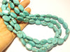 12x16mm Magnesite ovals, faded blue, 16 inch strand.