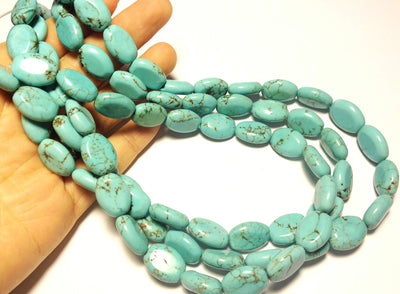 12x16mm Magnesite ovals, faded blue, 16 inch strand.