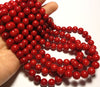 8.5mm rounds, bamboo coral, true red, 16 inch strand.