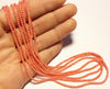 2mm Rounds, Bamboo Coral, Salmon Pink, 16 inch strand.