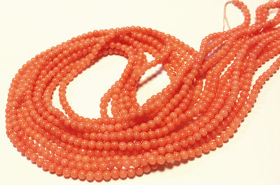 2mm Rounds, Bamboo Coral, Salmon Pink, 16 inch strand.