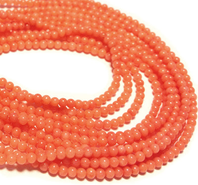 2mm Rounds, Bamboo Coral, Salmon Pink, 16 inch strand.