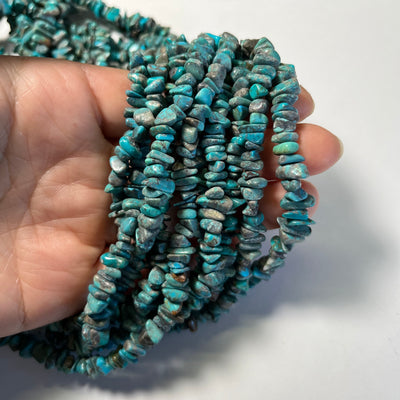 6mm Dark Chinese Turquoise Chips. 16 inch strand.