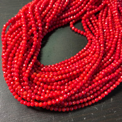 3.5mm Bamboo coral faceted rounds, true red, 16 inches long.