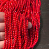 3.5mm Bamboo coral faceted rounds, true red, 16 inches long.