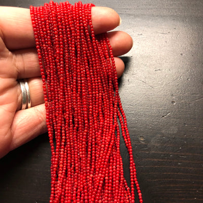1.8mm rounds, bamboo coral, true red, 16 inch strand.