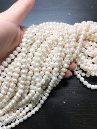 7-8mm freshwater pearls. 16 inch strand.