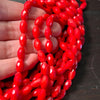 6x10mm Bamboo coral, faceted barrels, true red, 16 inches long