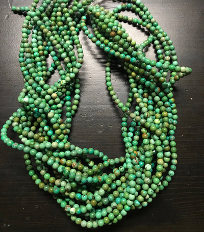 4mm bluish green Chinese Turquoise Rounds. 16 inch strand.