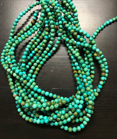 5mm Perfect Two-Tone Turquoise Rounds. 15.75 inch strand.