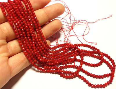 3mm Bamboo coral faceted rounds, true red, 16 inches long.